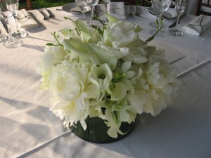 White perfection with orchids, calla lilies and peonies.